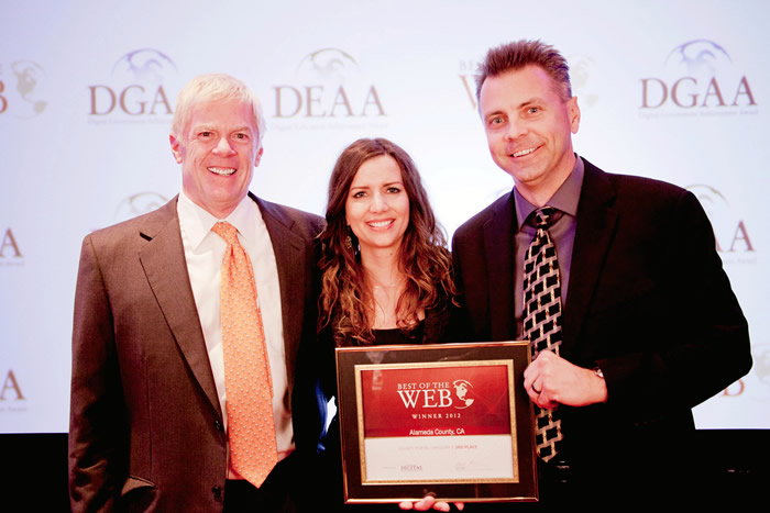 Photo showing staff accepting BOW award.